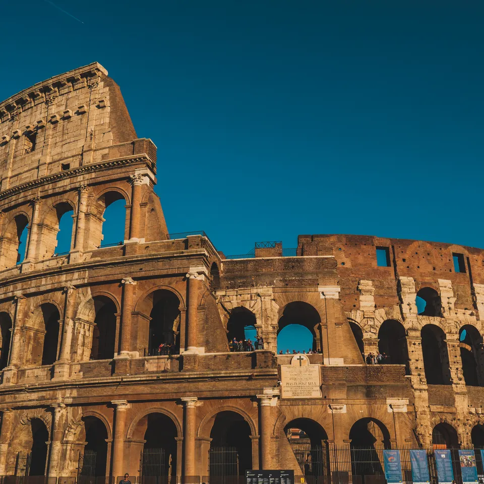 The sunlit arches of the Colosseum in Rome